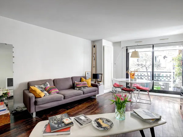 Montmartre au coeur du Village Ramey 3P traversant avec balcon de 72m² 