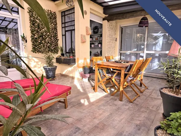 Appartement en ville : terrasse, garage et vue sur la colline ! 