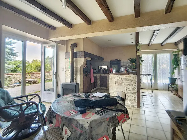 Maison T6 avec grand terrain 