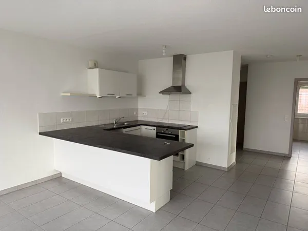 Appartement 4 pièces de 92 m² avec balcon - Résidence calme 