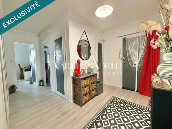 Appartement 2 chambres, balcon, cave privative et garage privatif 