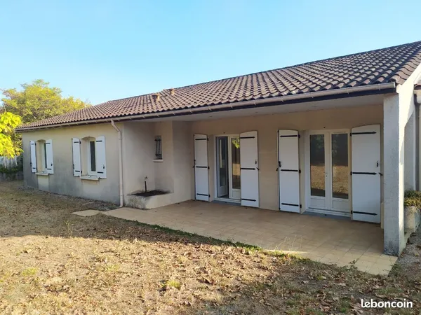 Maison avec jardin et garage 