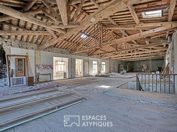 Loft brut à aménager 580 m² sur deux niveaux avec jardin de 700 m² à deux pas de la plage 