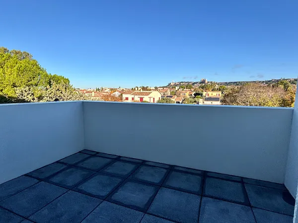 Appartement T2 de 43m² avec terrasse et place privative de stationnement 