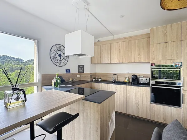 A vendre Type 3 66 m2, ascenseur, terrasse et double garage 