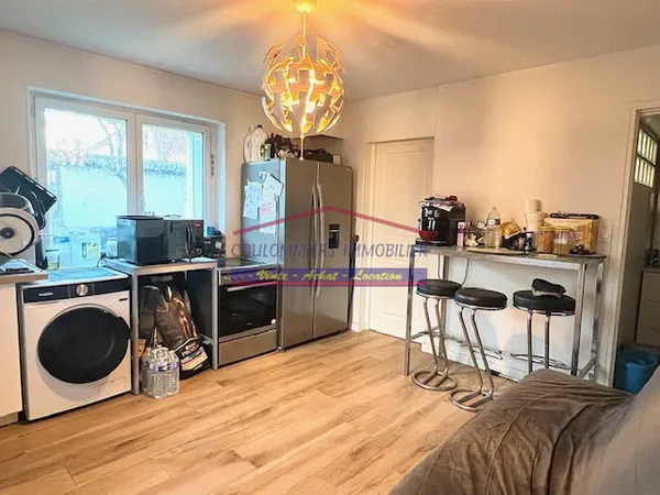 Appartement F1 en rez-de-jardin 