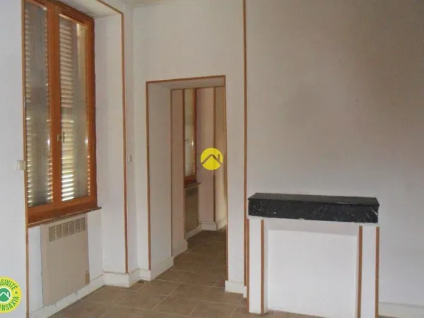 Appartement + Commerce ou autre 