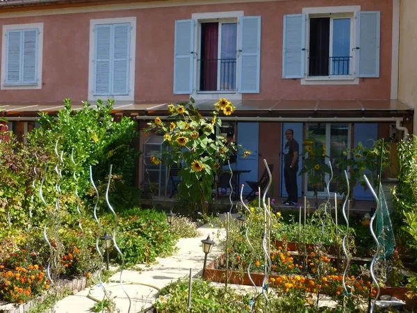Maison mitoyenne 89m² avec jardin et garage 