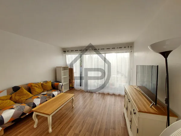 APPARTEMENT DE TROIS PIECES DE 75 M² AVEC 30 M²JARDIN PRIVATIF ET CAVE 