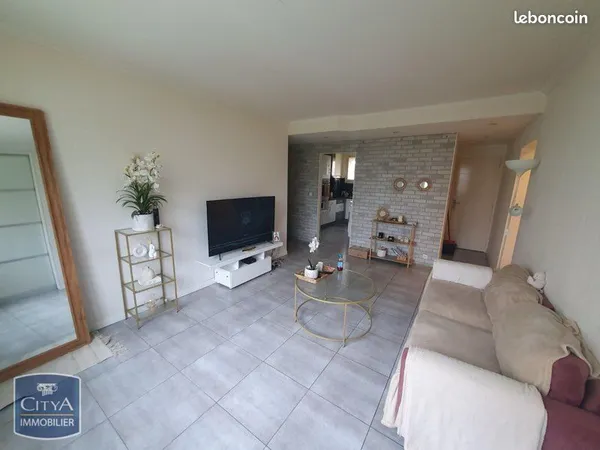 Appartement T4 RDC rue Belin avec Cave et parking 