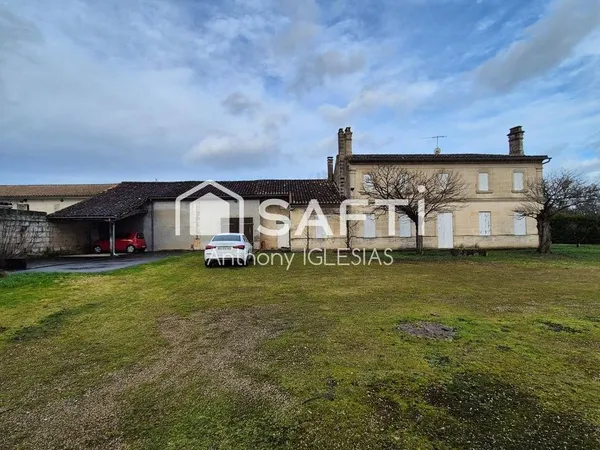 Ensemble immobilier composé d'une maison d'habitation, chai, terrain constructible 