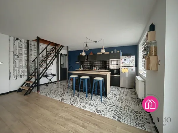 Maison semi individuelle avec 2 biens locatifs 