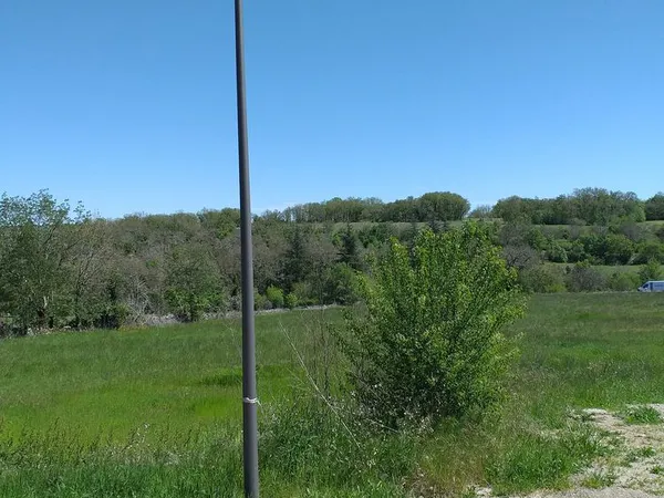 Terrain avec CU de 5000m² à AUJOLS 
