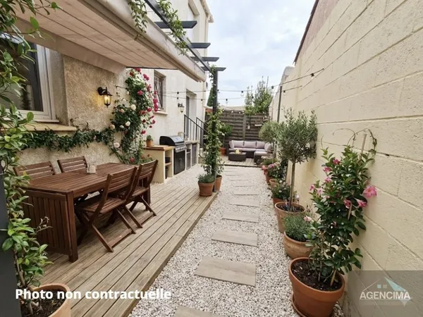 Appartement T3 en rez-de jardin avec garage 