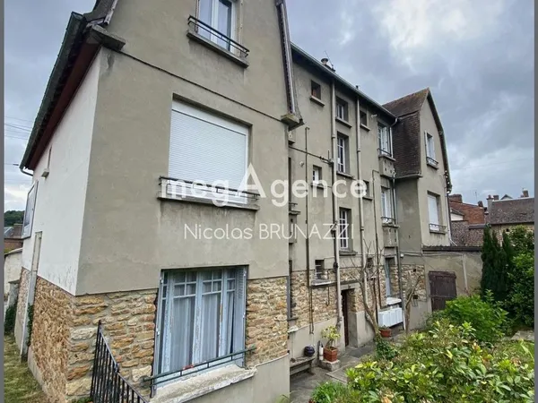 Appartement avec garage et jardin 