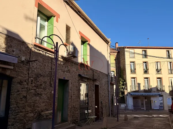 Immeuble de rapport rénové Coeur de village à ST GENIS DES 