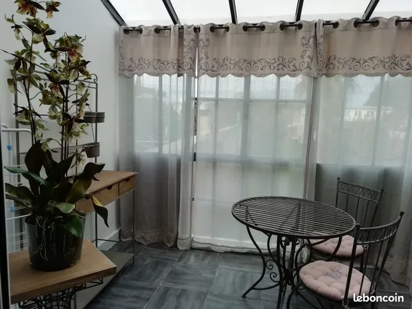 T2 charme avec jardin d'hiver 