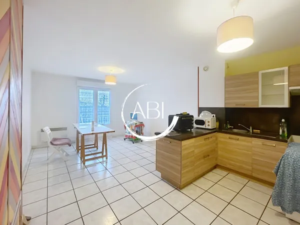 Appartement 3 pièces 63 m² 2 caves 2 parkings 