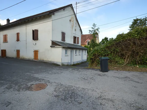 Immeuble à rénover de 3 appartements à Voujeaucourt 