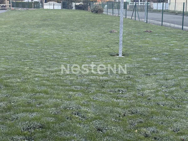 Terrain constructible viabilisé de 412m² hors lotissement à Questembert 