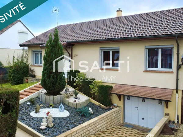 Maison avec jardin arboré, terrasse et sous-sol 