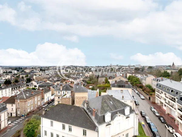 Appartement T3 avec 2 balcons, 2 garages et une place de sta 