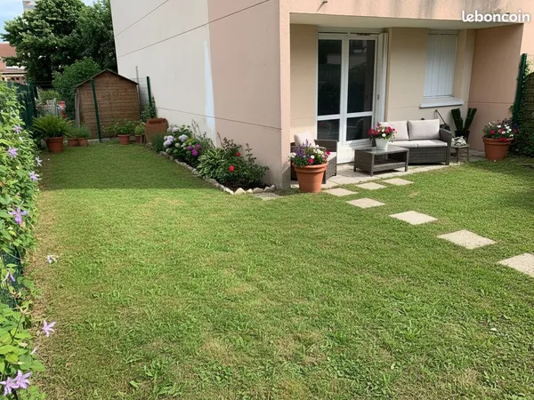 Appartement avec jardin et parking 