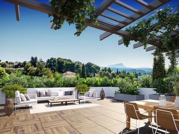 APPARTEMENT EN ANGLE ET TRAVERSANT DE 110M² AVEC 40M² DE TERRASSE ET 50M² DE ROOFTOP, VUE DEGAGEE 