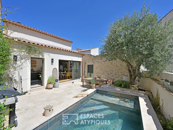 Maison de village rénovée, cour intimiste et commodités à deux pas 