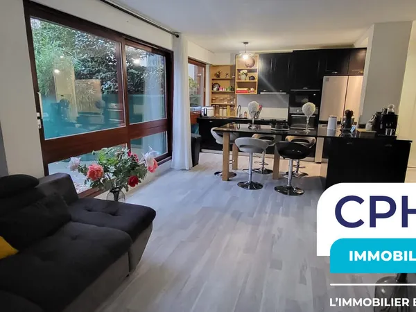 Vaste appartement avec immense jardin 