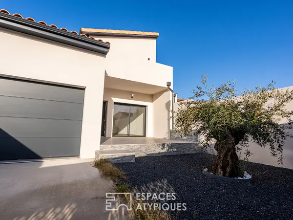 Maison neuve aux lignes modernes avec jardin et terrasses 