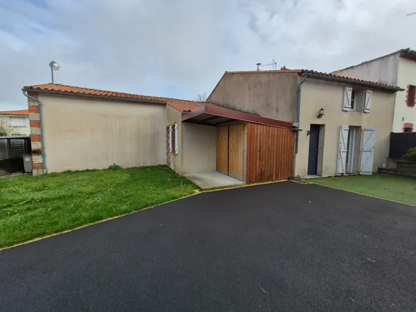 Plain pied - 2 chambres en centre bourg 