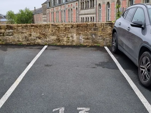 Place de parking sécurisée - Hypercentre 