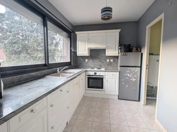 Appartement T2 dans résidence sécurisée avec place de parking privative 