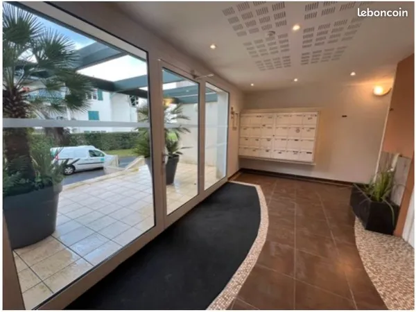 Appartement T3 avec terrasse 64,6 m2 et 2 places de parking couvertes 