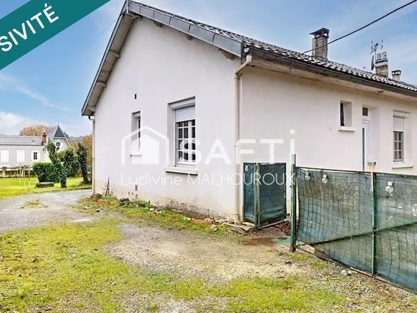 Maison familiale avec jardin, garage et terrasse 