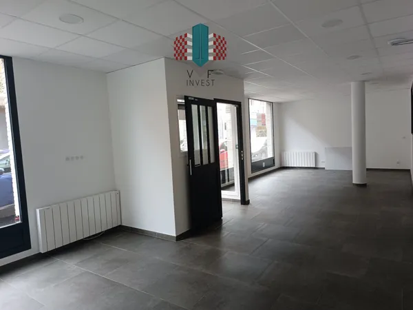 Local commercial, place de parking, centre ville 
