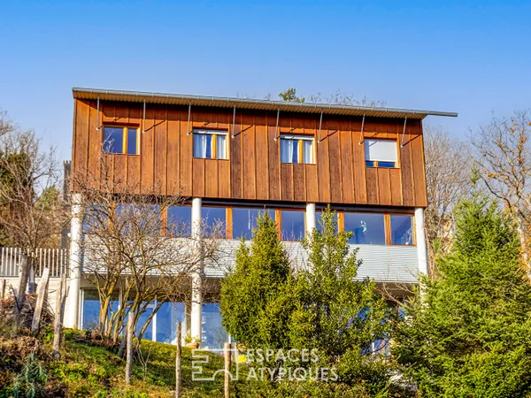 Maison ossature bois avec vue panoramique sur la plaine 