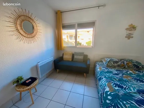 T2 residence face mer et faibles charges parking 