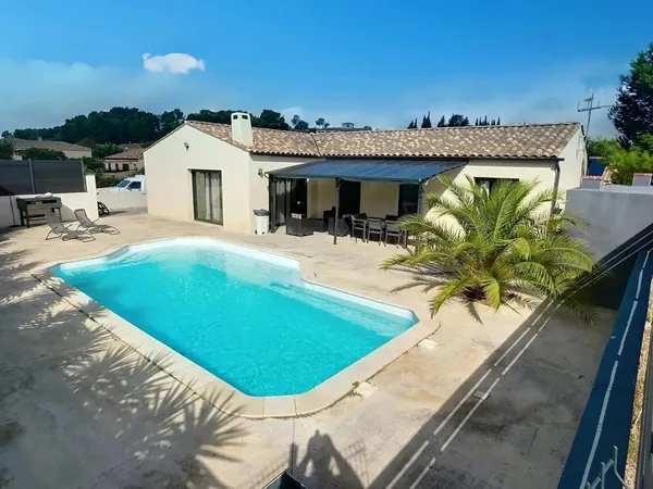 Villa 4 faces 121 m² 4 chambres sur terrain de 1235 m² avec piscine et garage 