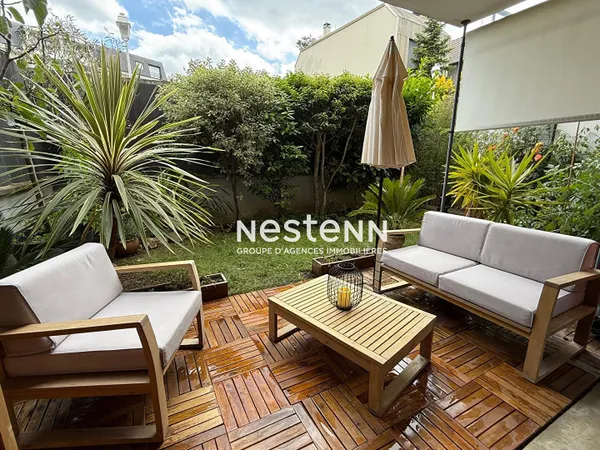ISSY LES MOULINEAUX - Appartement 3 pièces traversant en rez-de-jardin 