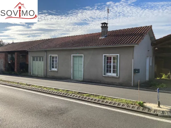 MAISON DE BOURG, PLAIN PIED AVEC JARDIN ET GARAGE ATTENANT 