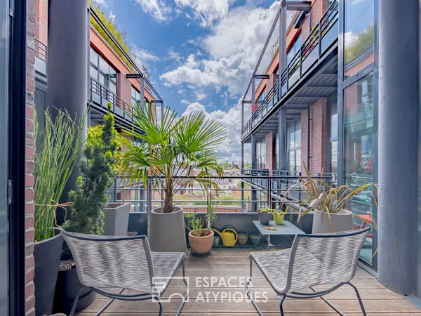 Loft d'architecte non meublé avec balcon et parking 