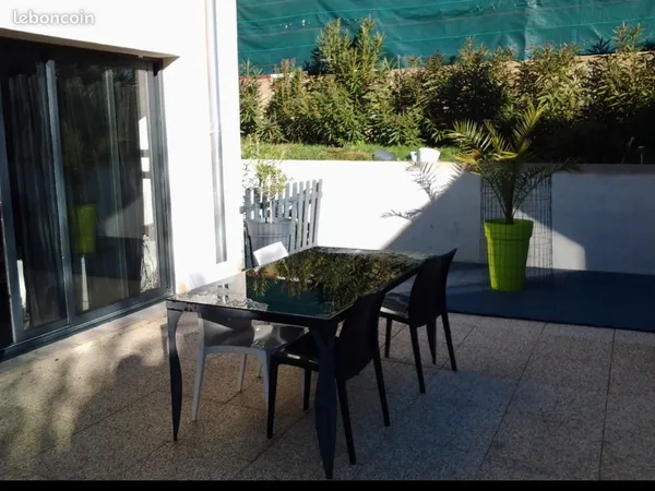 T2 de 34 m2 , terrasse 70 m2 parking 