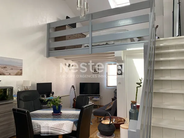 En plein centre ville Duplex avec garage 
