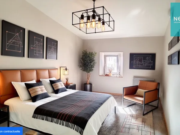 Appartement Saint Romain Le Puy - 2 chambres - centre ville - parking communal en face 