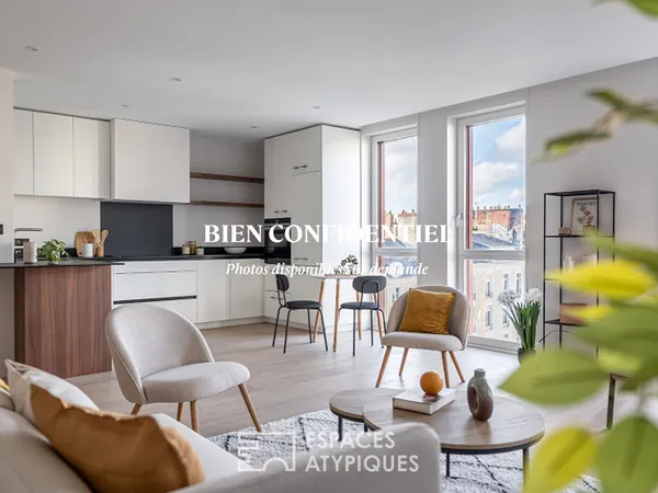 138 m² de volumes et lumière dans un duplex d'exception - Place de Bretagne 