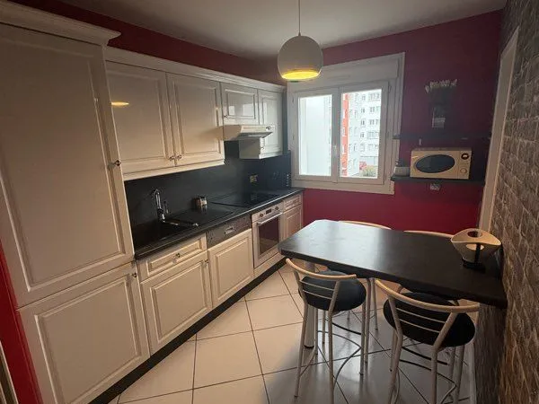 Appartement F3 avec balcon, garage et cave 