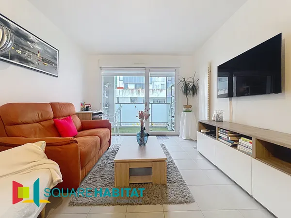 Centre-ville: Charmant T2 avec grand balcon et parking 