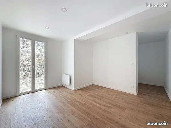 Appartement 75m2 2 chambres Cave et jardin 